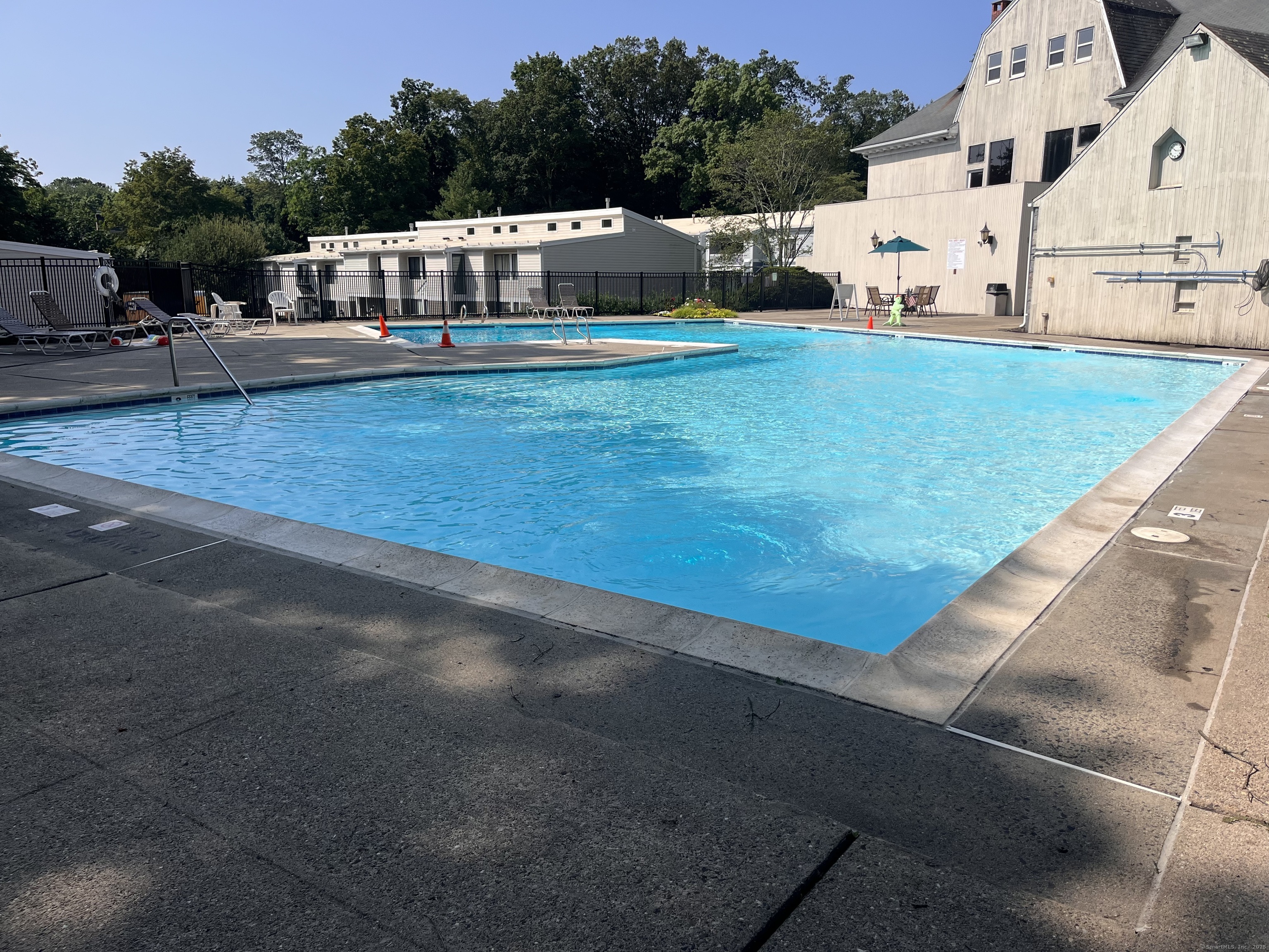 2 Cook Close, Unit 2 Ridgefield, CT 06877 - Photo 18 of 24 a view of a house with a yard