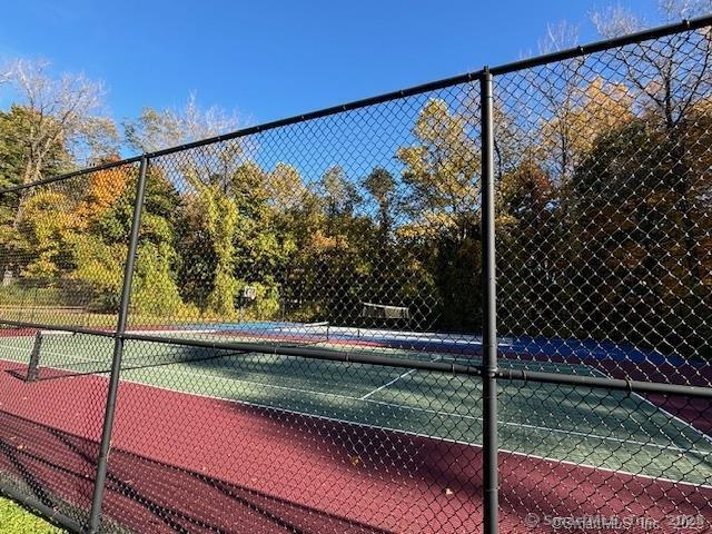 2 Cook Close, Unit 2 Ridgefield, CT 06877 - Photo 22 of 24 a view of a yard with a street