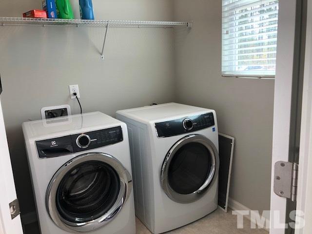 6000 Beale Loop Raleigh, NC 27616 - Photo 11 of 16 a utility room with dryer and washer