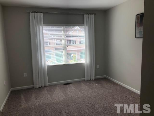 6000 Beale Loop Raleigh, NC 27616 - Photo 16 of 16 a view of an empty room with a window