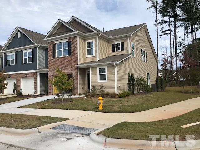 6000 Beale Loop Raleigh, NC 27616 - Photo 2 of 16 a front view of a house with a yard