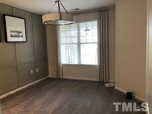 6000 Beale Loop Raleigh, NC 27616 - Photo 8 of 16 a view of an empty room with a window