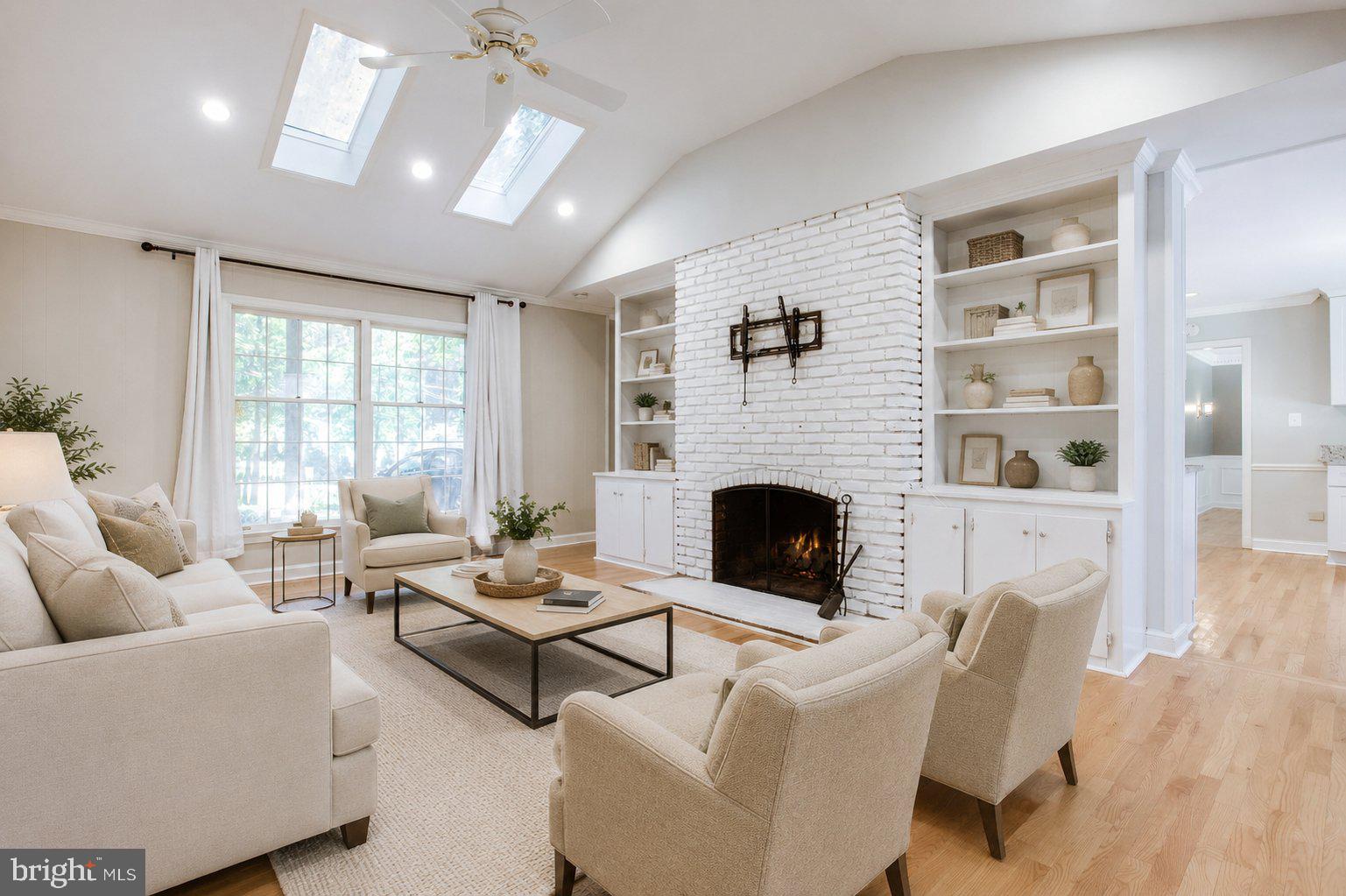 8500 Brook Road McLean, VA 22102 - Photo 20 of 59 a living room with furniture fireplace and window