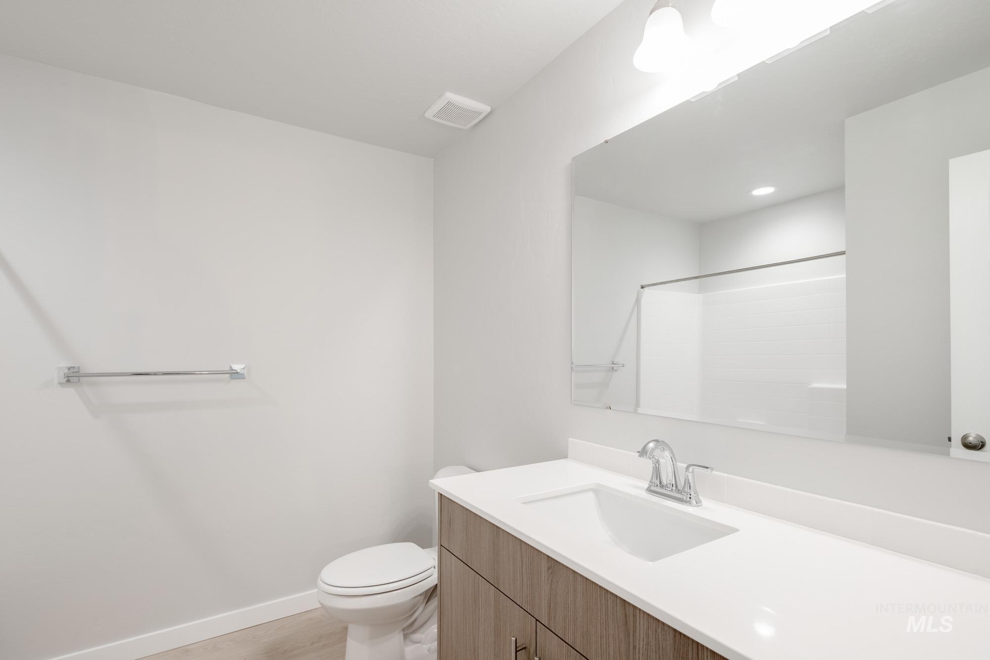 229 Moose Street Horseshoe Bend, ID 83629 - Photo 16 of 27 Full bath with vanity and a shower