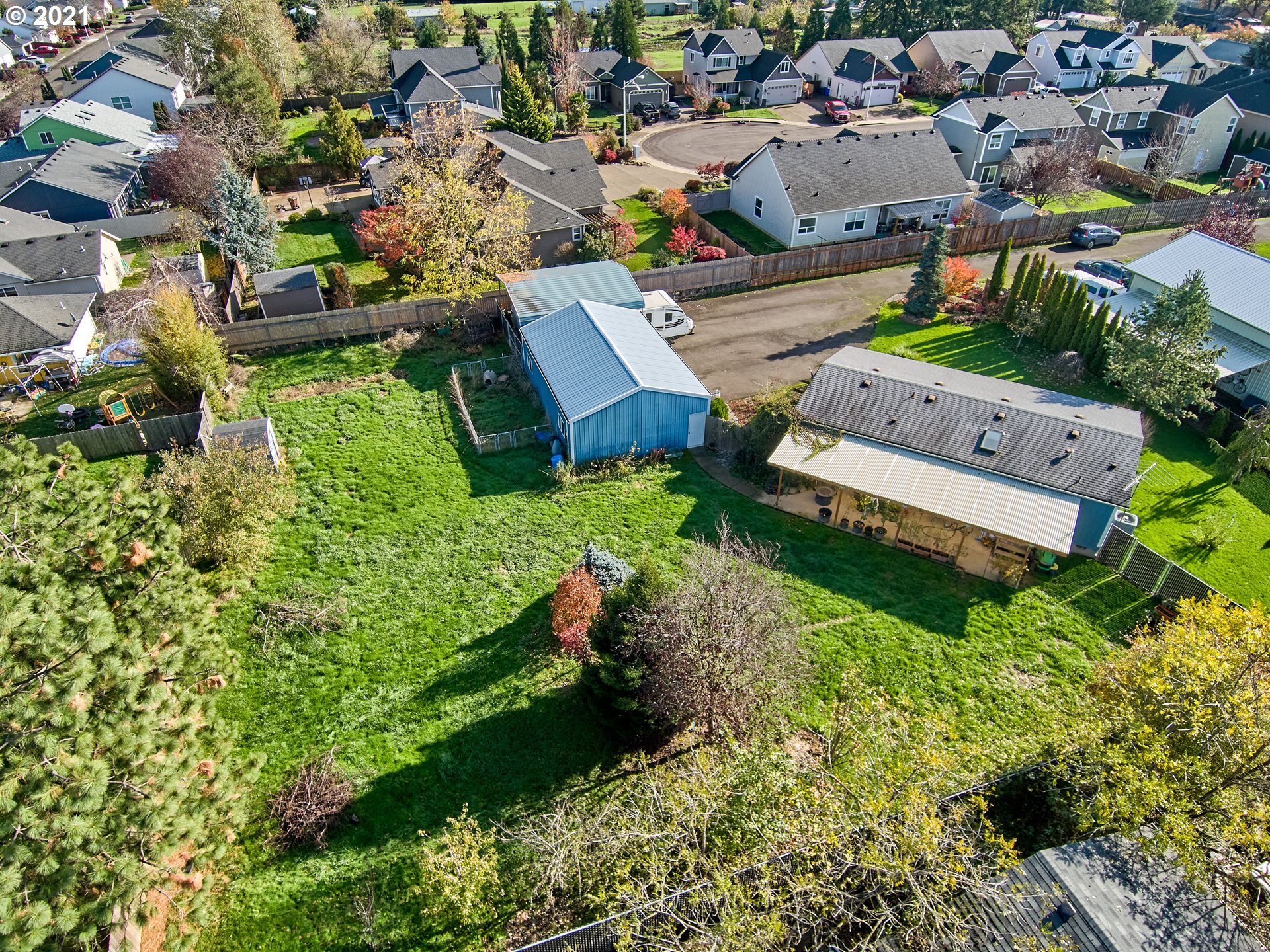 913 Toliver Road, Unit B Molalla, OR 97038 - Photo 24 of 26 an aerial view of a house with a garden