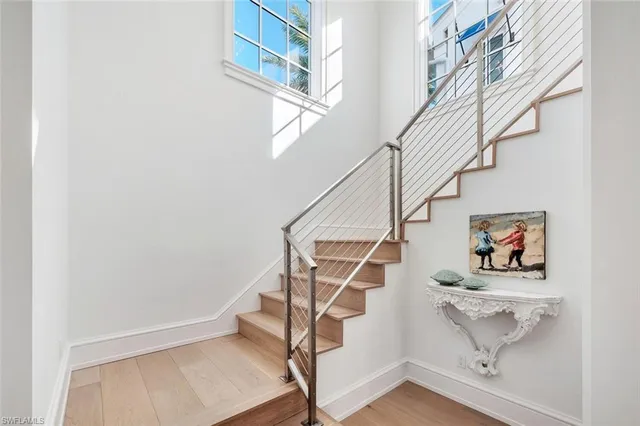 a view of entryway with wooden floor
