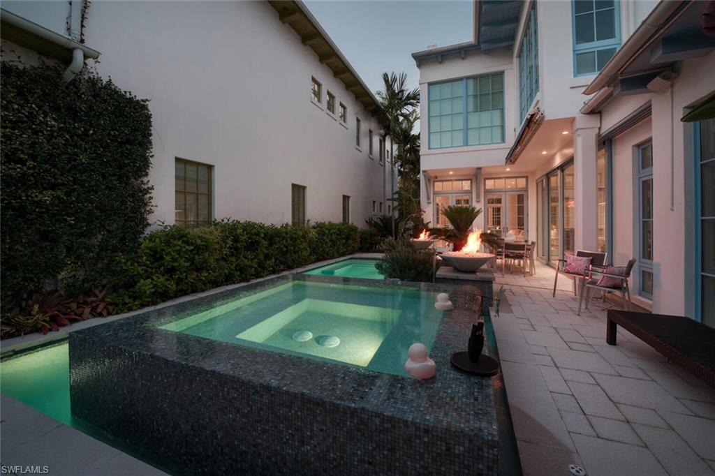 982 9th Avenue South Naples, FL 34102 - Photo 46 of 48 a view of swimming pool with outdoor seating