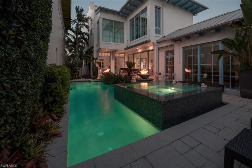 982 9th Avenue South Naples, FL 34102 - Photo 47 of 48 a view of a house with backyard porch and sitting area