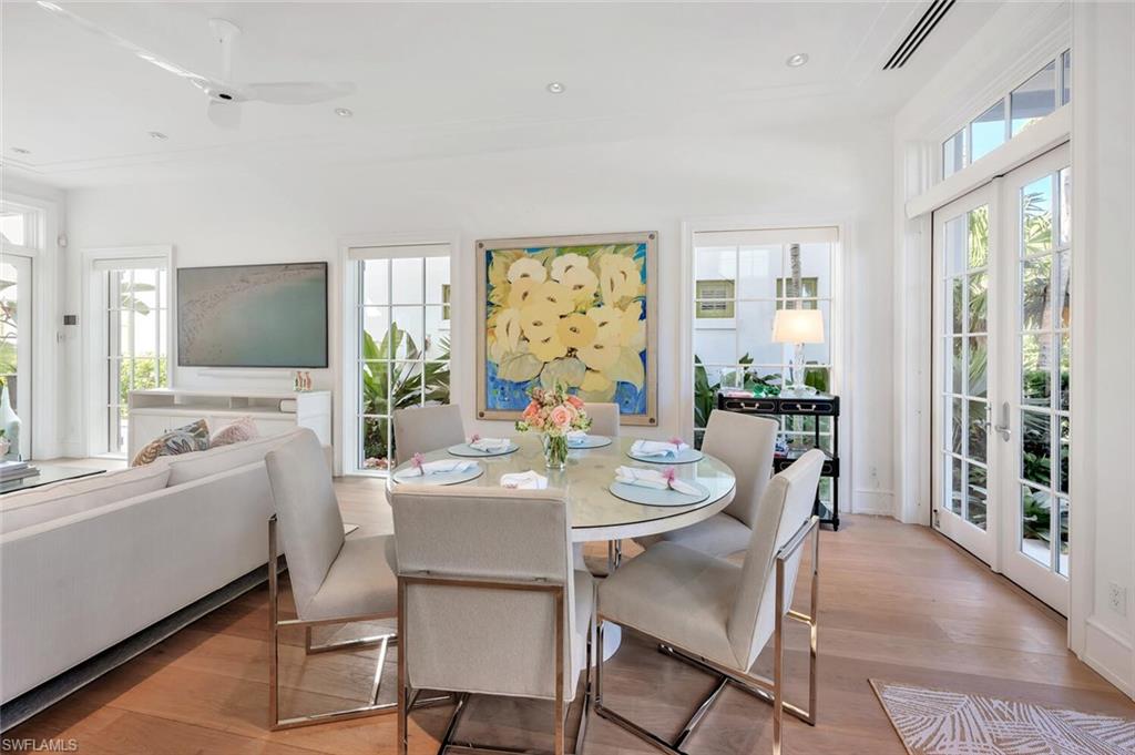 982 9th Avenue South Naples, FL 34102 - Photo 7 of 48 a view of a dining room with furniture window and outside view