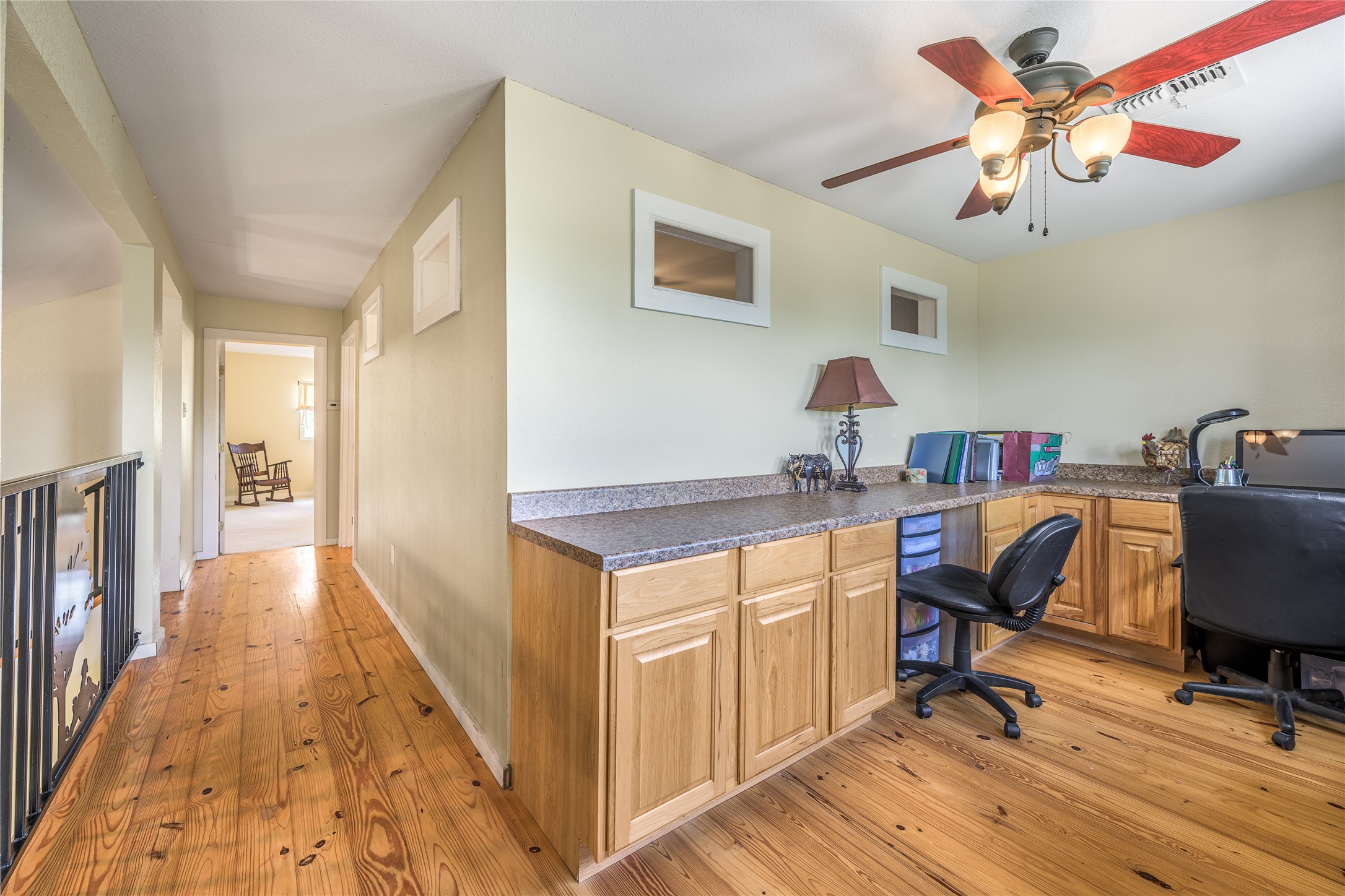 4310 Leslie Road Fayetteville, TX 78940 - Photo 20 of 22 a view of a workspace with furniture and a window