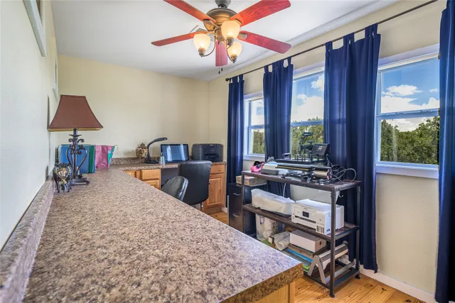 a bed room with a bed and a chandelier