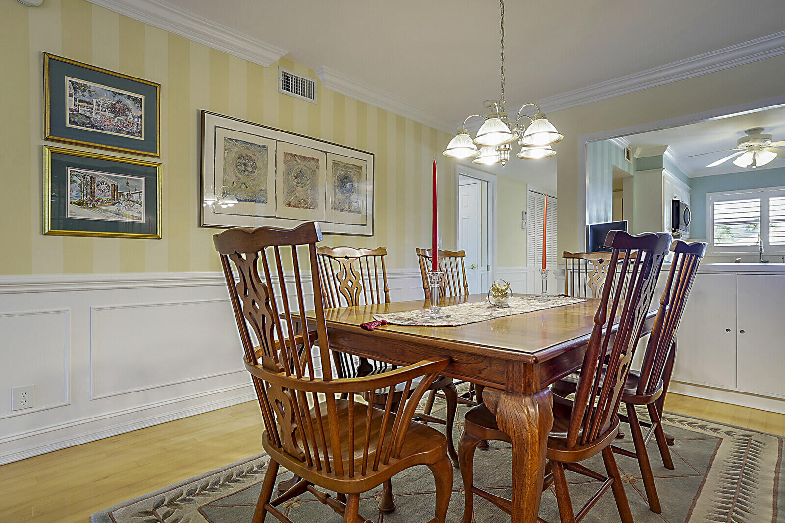 700 Harbour Drive, Unit 2310 Boca Raton, FL 33431 - Photo 15 of 40 a view of a dining room with furniture window and wooden floor