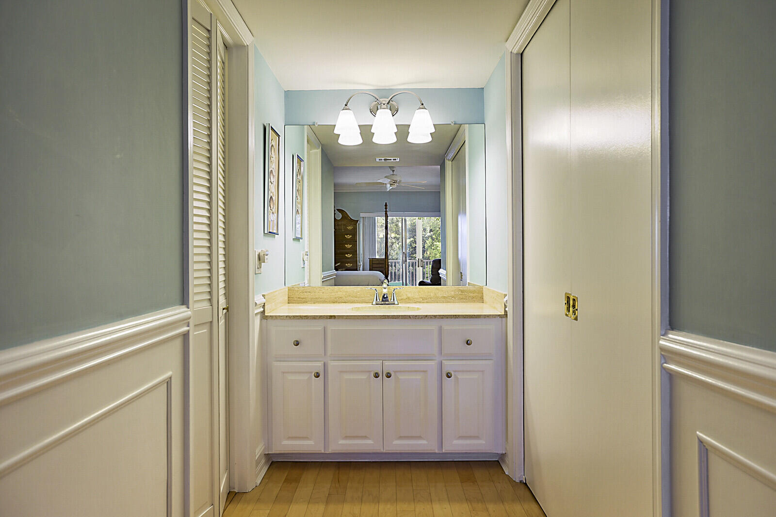 700 Harbour Drive, Unit 2310 Boca Raton, FL 33431 - Photo 20 of 40 a bathroom with a double vanity sink and a mirror