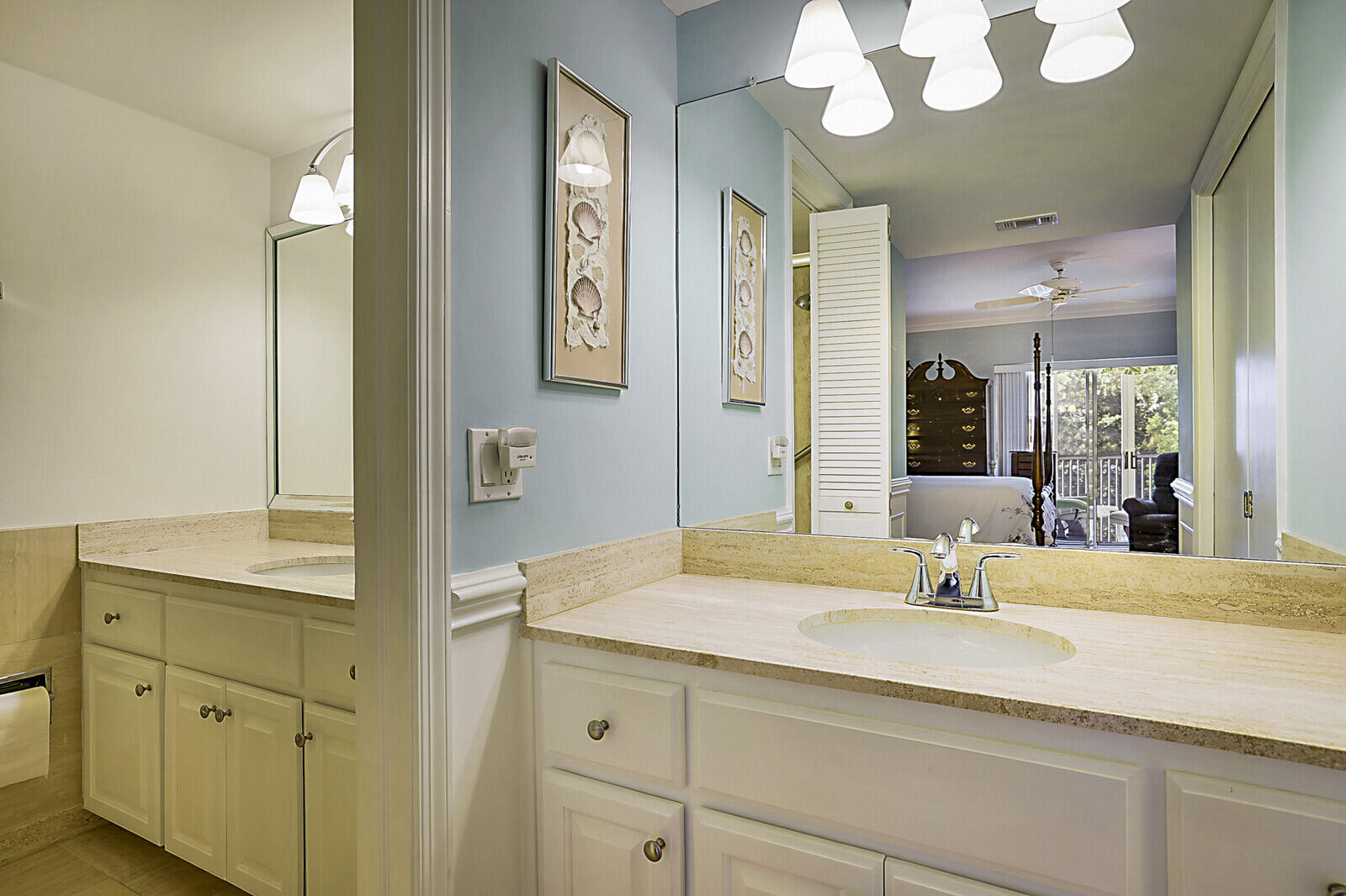 700 Harbour Drive, Unit 2310 Boca Raton, FL 33431 - Photo 21 of 40 a bathroom with a sink and a mirror
