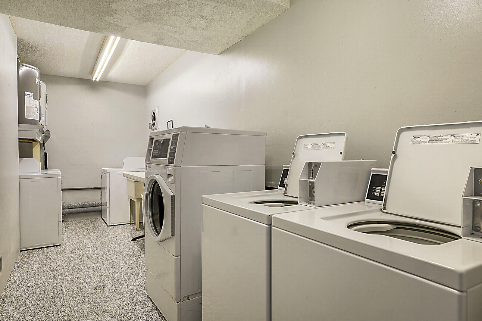 700 Harbour Drive, Unit 2310 Boca Raton, FL 33431 - Photo 27 of 40 a utility room with dryer and washer