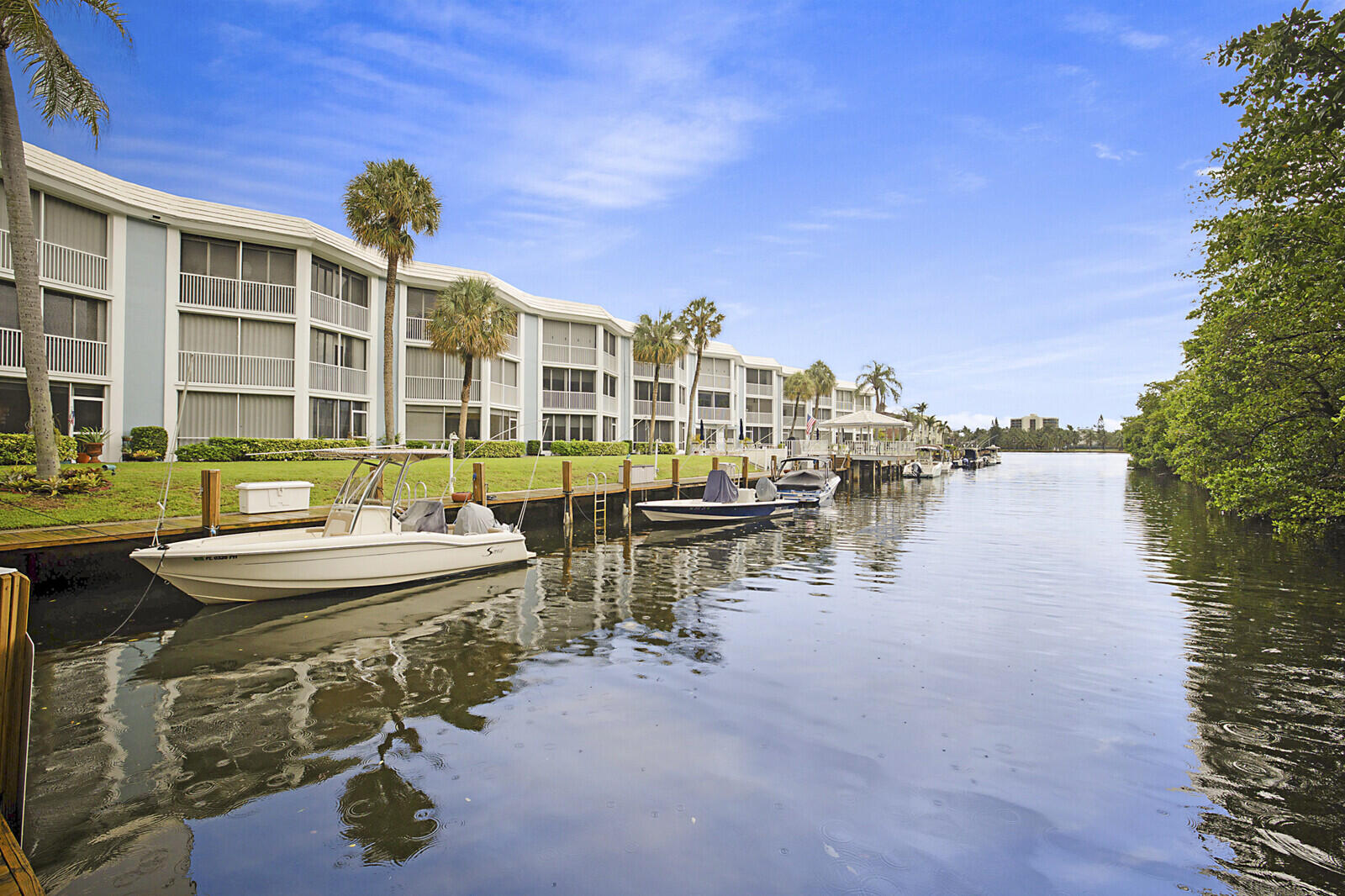 700 Harbour Drive, Unit 2310 Boca Raton, FL 33431 - Photo 29 of 40 a view of a lake with building in front of it
