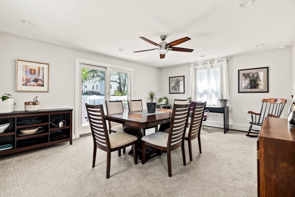 15 Dow Road Boston, MA 02132 - Photo 11 of 40 a view of a dining room with furniture and a window