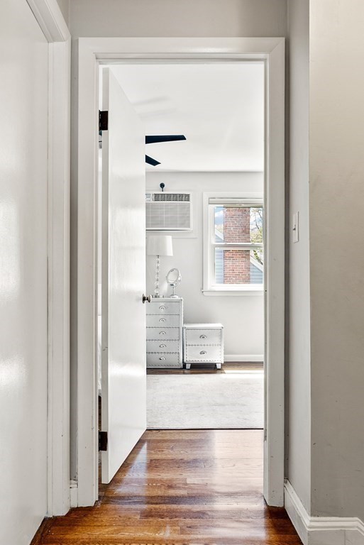 15 Dow Road Boston, MA 02132 - Photo 21 of 40 a view of a room with wooden floor and windows