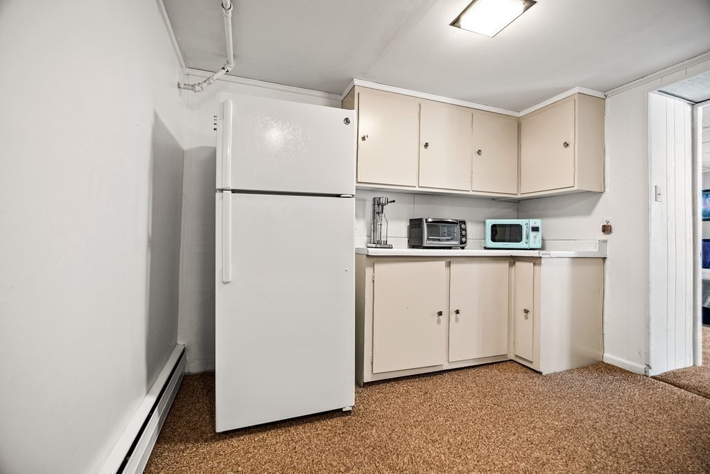 15 Dow Road Boston, MA 02132 - Photo 28 of 40 a view of kitchen with cabinets