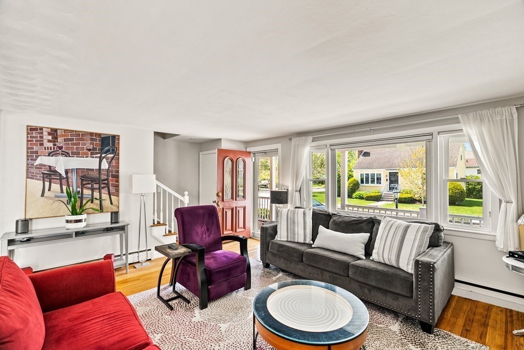 15 Dow Road Boston, MA 02132 - Photo 3 of 40 a living room with furniture and a large window