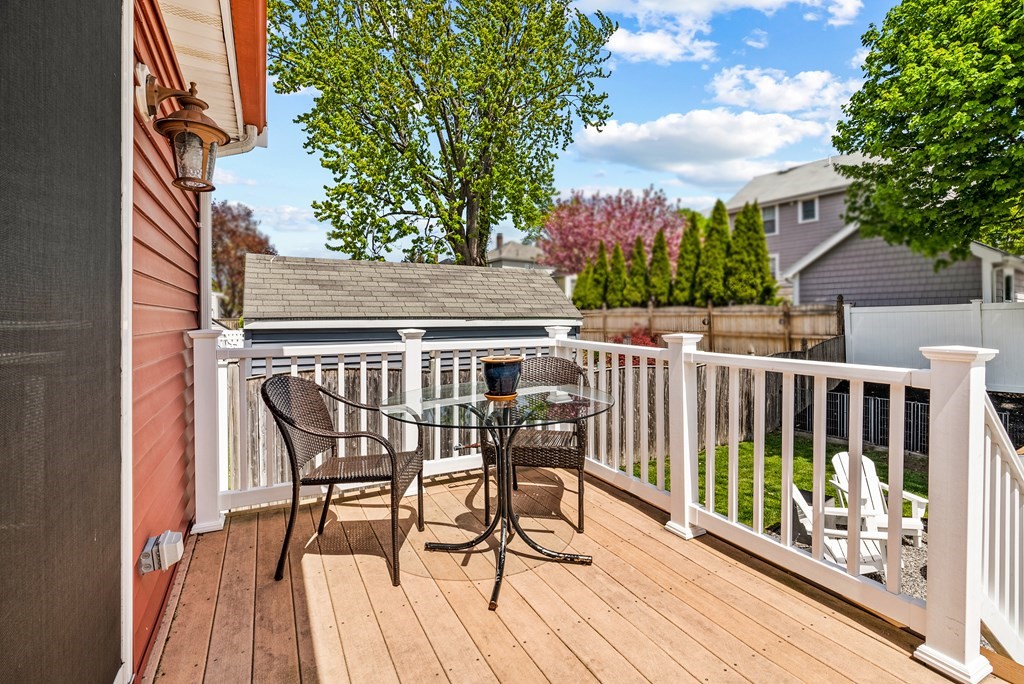 15 Dow Road Boston, MA 02132 - Photo 32 of 40 a view of balcony with wooden floor and outdoor seating