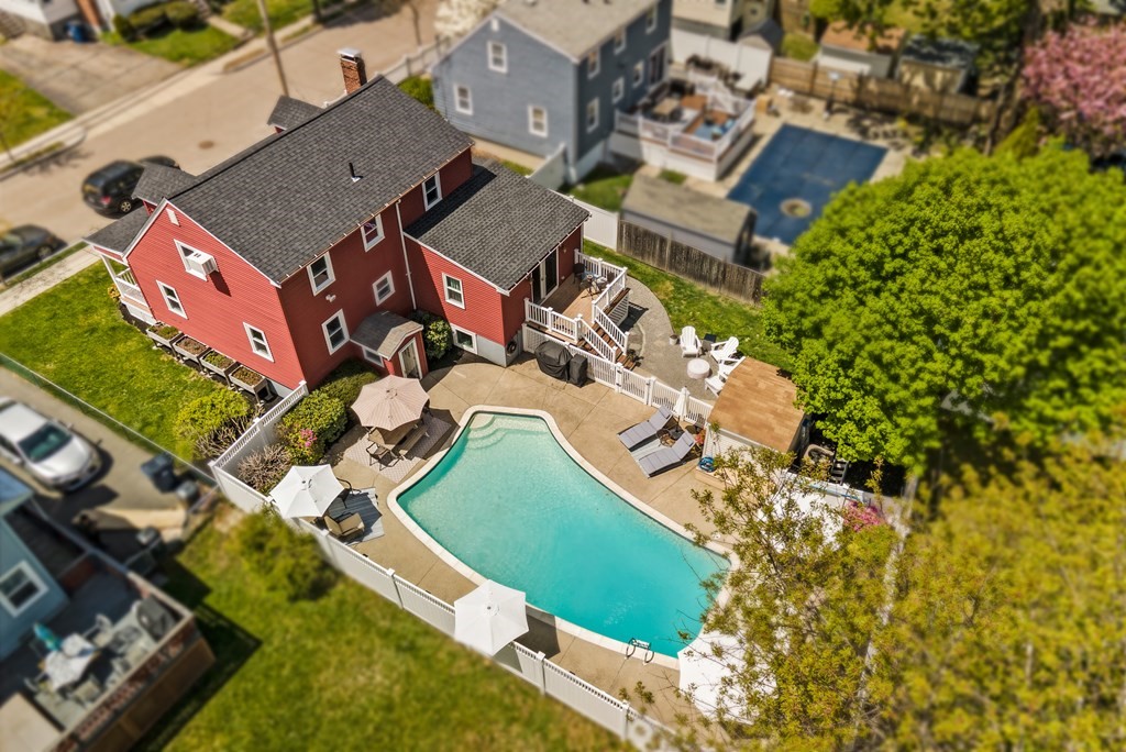 15 Dow Road Boston, MA 02132 - Photo 37 of 40 an aerial view of a house with a garden and trees