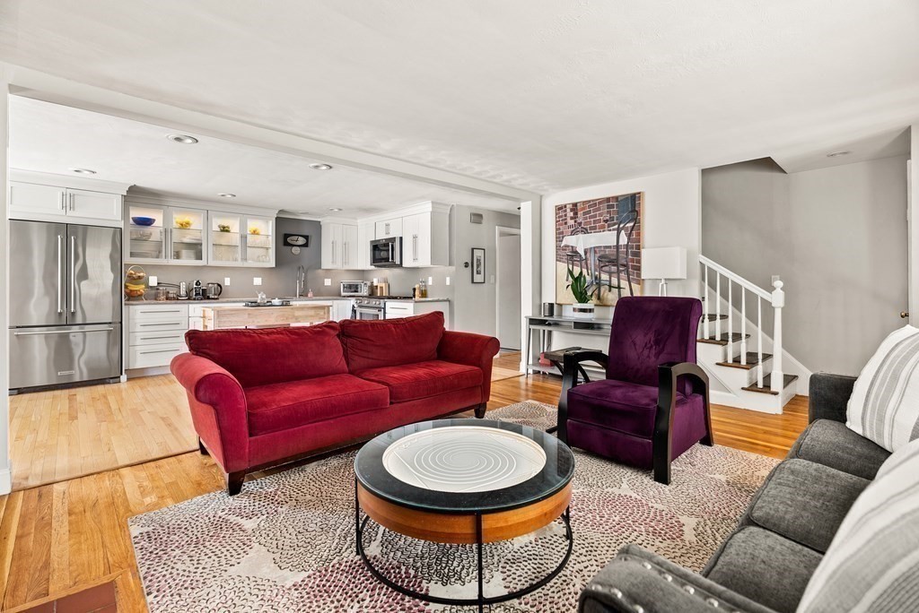 15 Dow Road Boston, MA 02132 - Photo 5 of 40 a living room with furniture a couch and a window