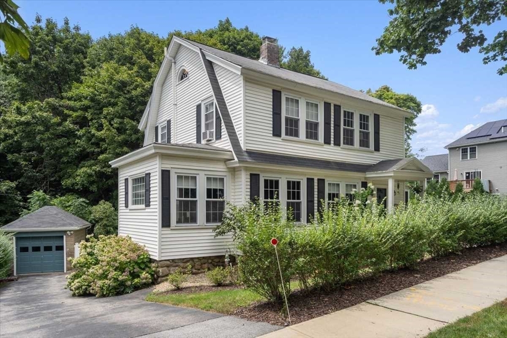61 Havelock Road Worcester, MA 01602 - Photo 1 of 37 a view of a white house next to a yard