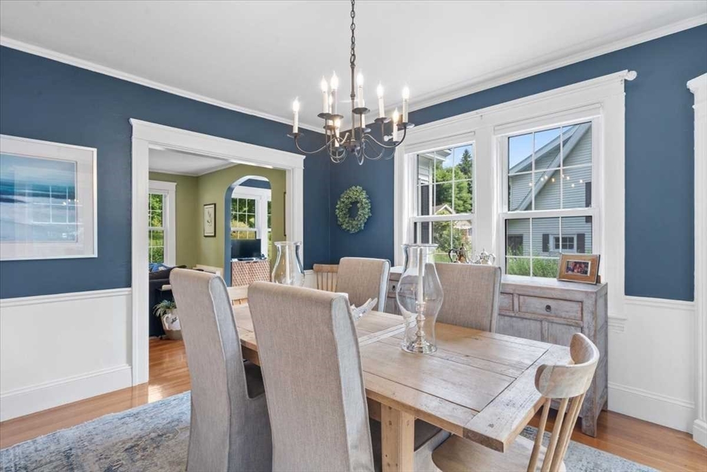 61 Havelock Road Worcester, MA 01602 - Photo 11 of 37 a view of a dining room with furniture wooden floor and chandelier