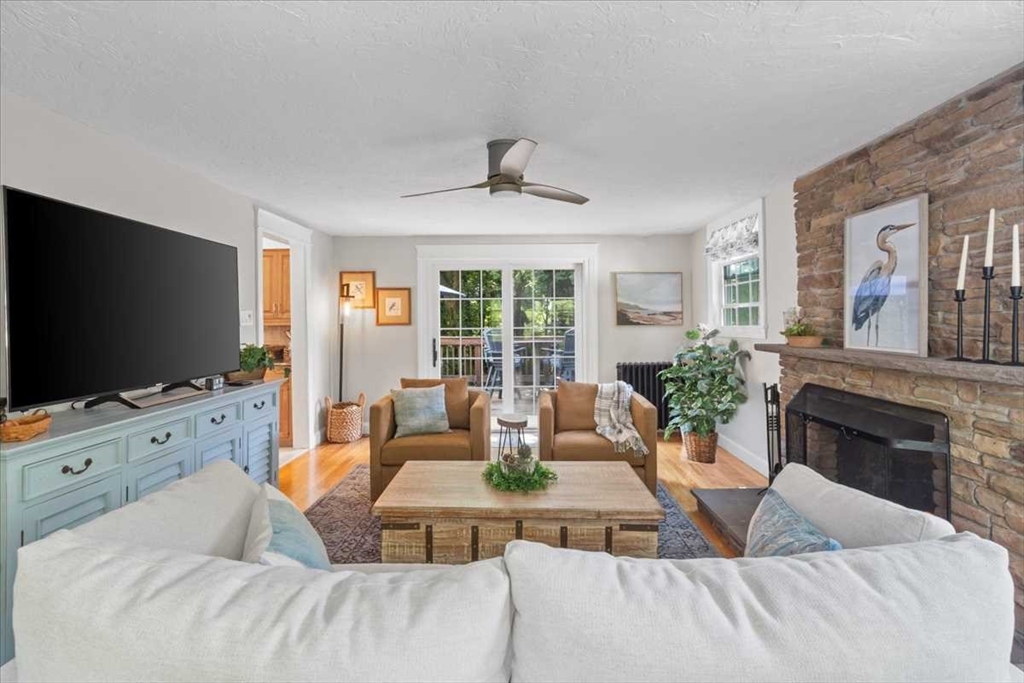 61 Havelock Road Worcester, MA 01602 - Photo 18 of 37 a living room with furniture and a flat screen tv