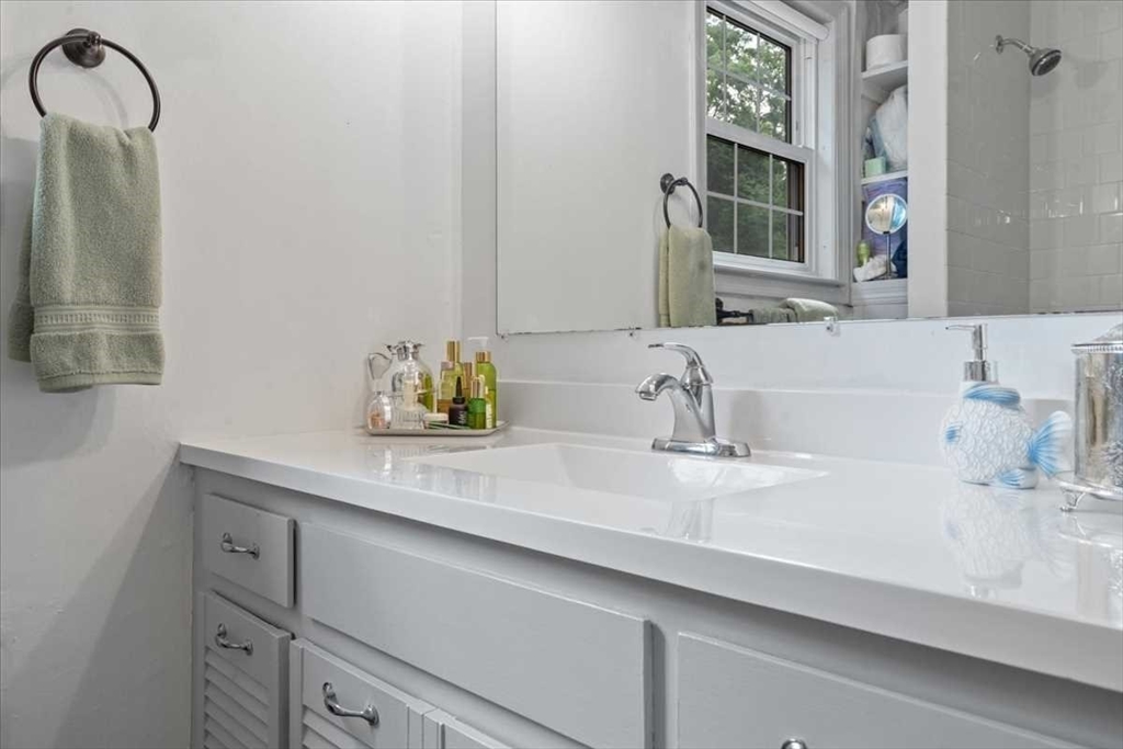 61 Havelock Road Worcester, MA 01602 - Photo 28 of 37 a bathroom with a sink and a mirror
