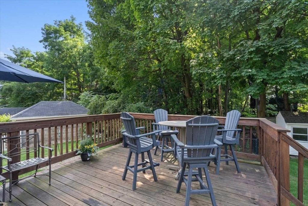 61 Havelock Road Worcester, MA 01602 - Photo 30 of 37 a view of a table and chairs on the roof deck