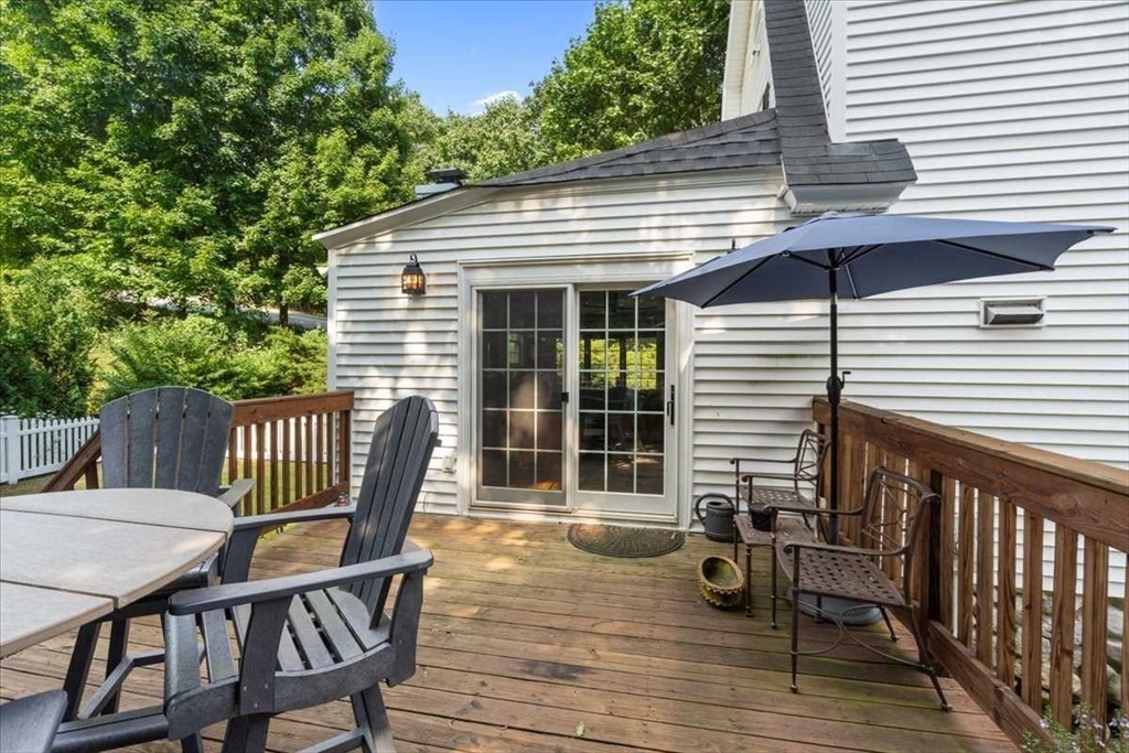 61 Havelock Road Worcester, MA 01602 - Photo 31 of 37 a view of a chair and table on the deck