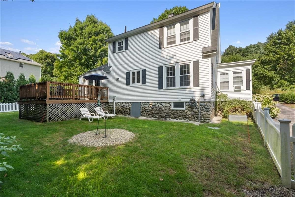 61 Havelock Road Worcester, MA 01602 - Photo 35 of 37 a backyard of a house with table and chairs