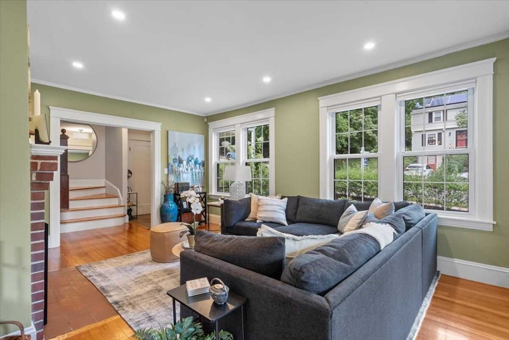 61 Havelock Road Worcester, MA 01602 - Photo 5 of 37 a living room with furniture and a large window