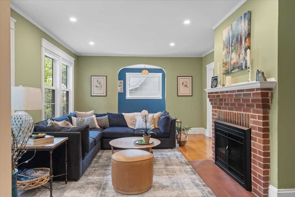 61 Havelock Road Worcester, MA 01602 - Photo 6 of 37 a living room with furniture a window and a fireplace