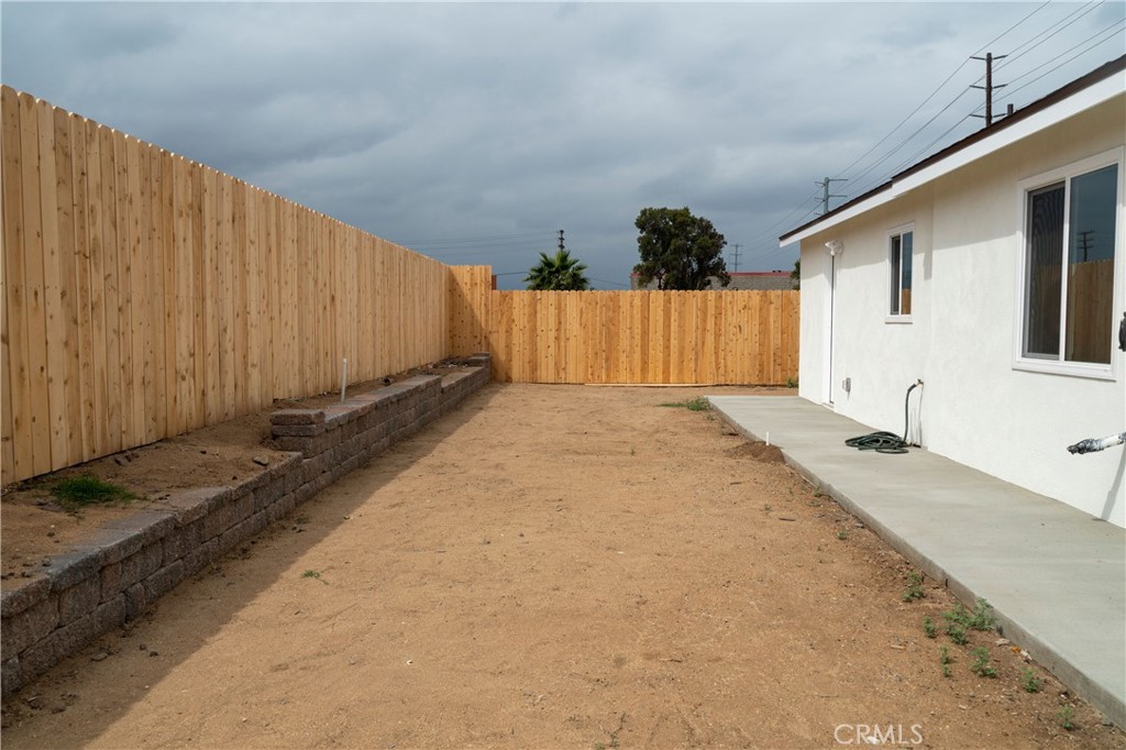 9426 Indiana Avenue Riverside, CA 92503 - Photo 22 of 26 Back Yard & Retaining Brick Wall