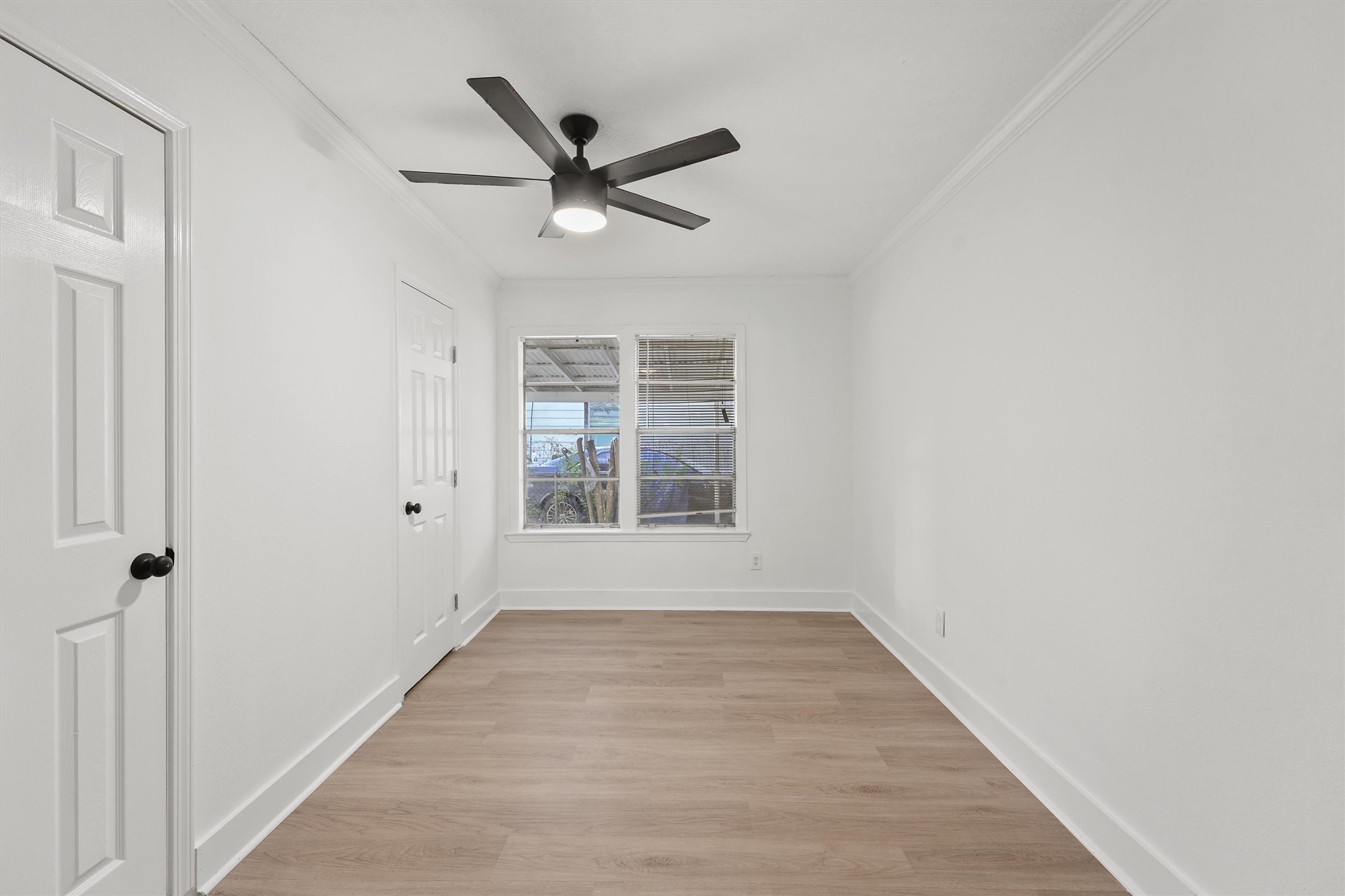 4029 Lucille Street Houston, TX 77026 - Photo 14 of 28 a view of a big room with wooden floor closet and windows