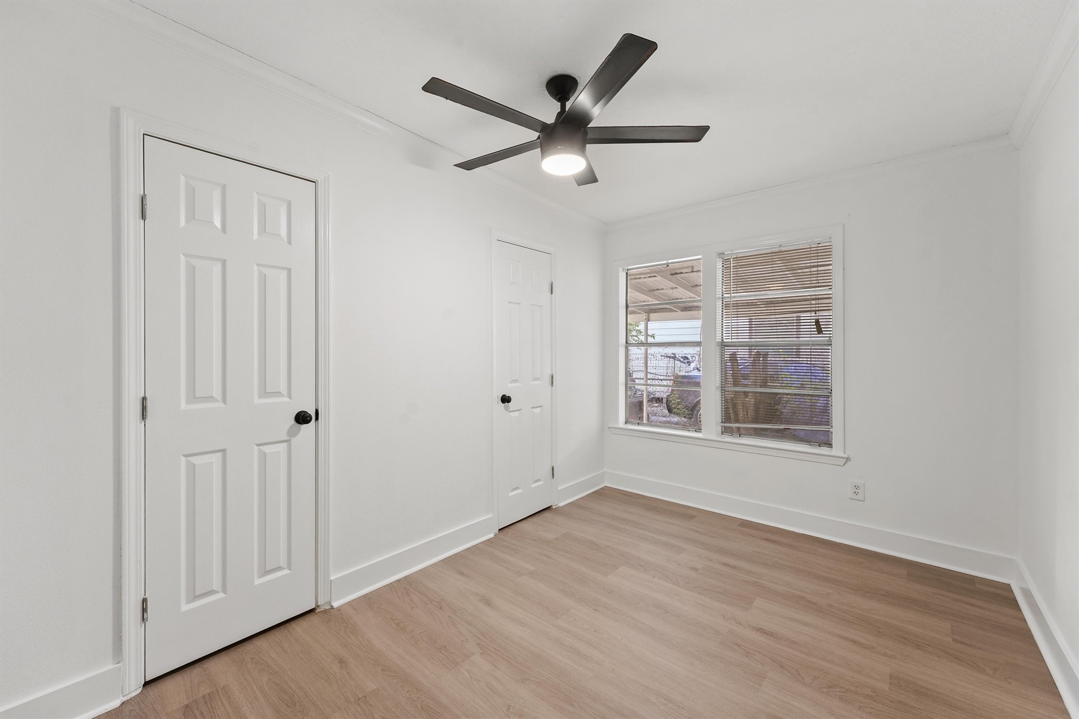 4029 Lucille Street Houston, TX 77026 - Photo 15 of 28 wooden floor in an empty room with a window