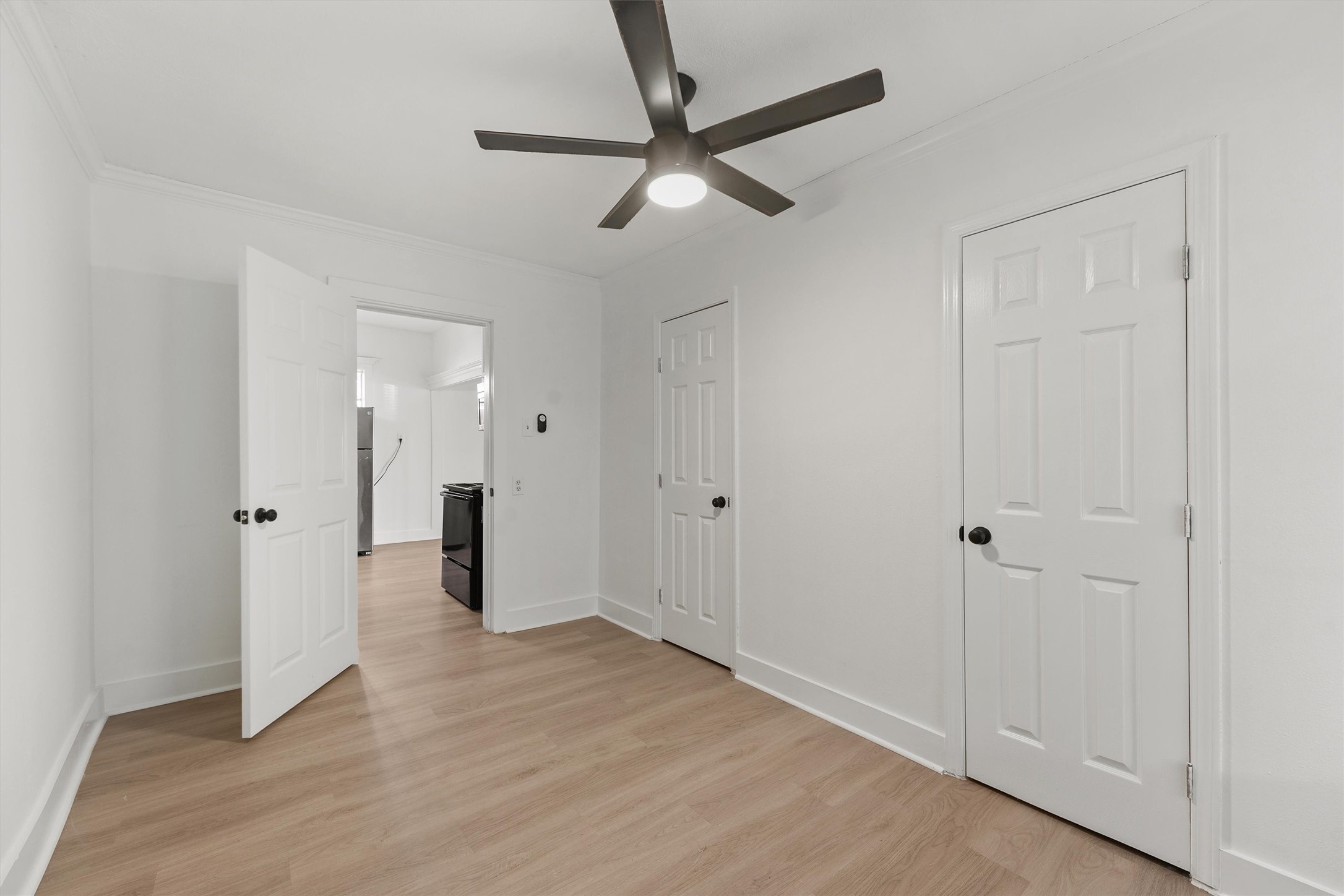 4029 Lucille Street Houston, TX 77026 - Photo 16 of 28 a view of empty room with wooden floor