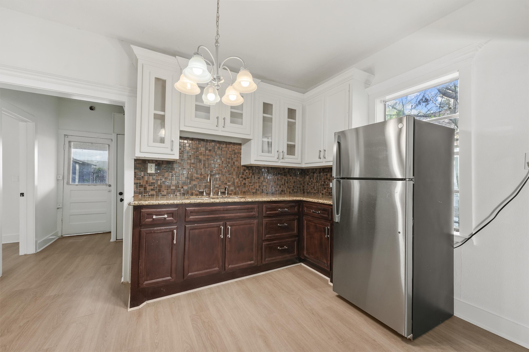 4029 Lucille Street Houston, TX 77026 - Photo 7 of 28 a kitchen with stainless steel appliances granite countertop a refrigerator a oven and a sink