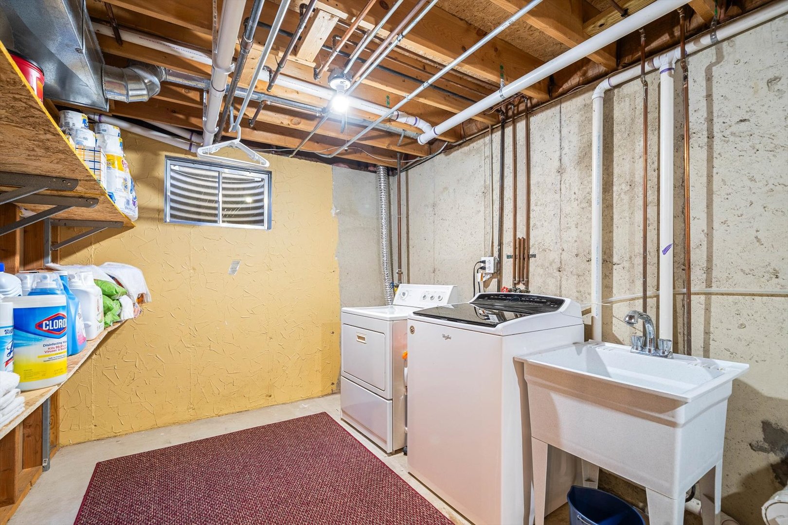 431 Badger Lane Oswego, IL 60543 - Photo 12 of 19 a utility room with a stove a washer and dryer