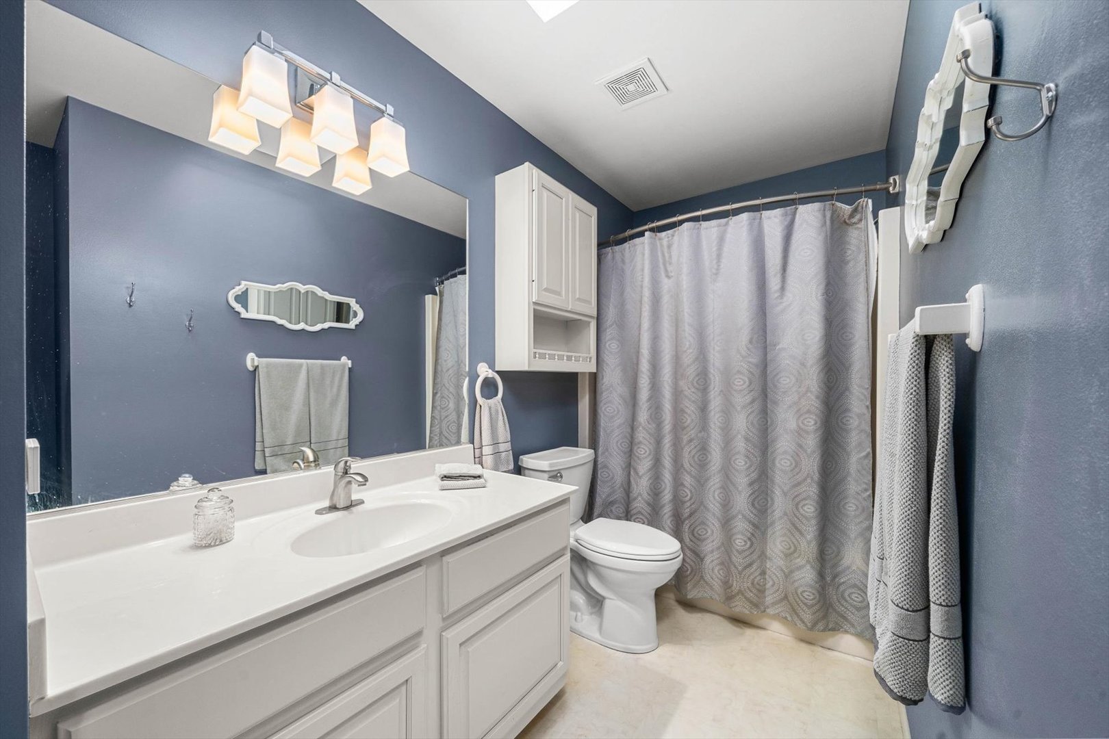 431 Badger Lane Oswego, IL 60543 - Photo 15 of 19 a bathroom with a double vanity sink toilet and shower