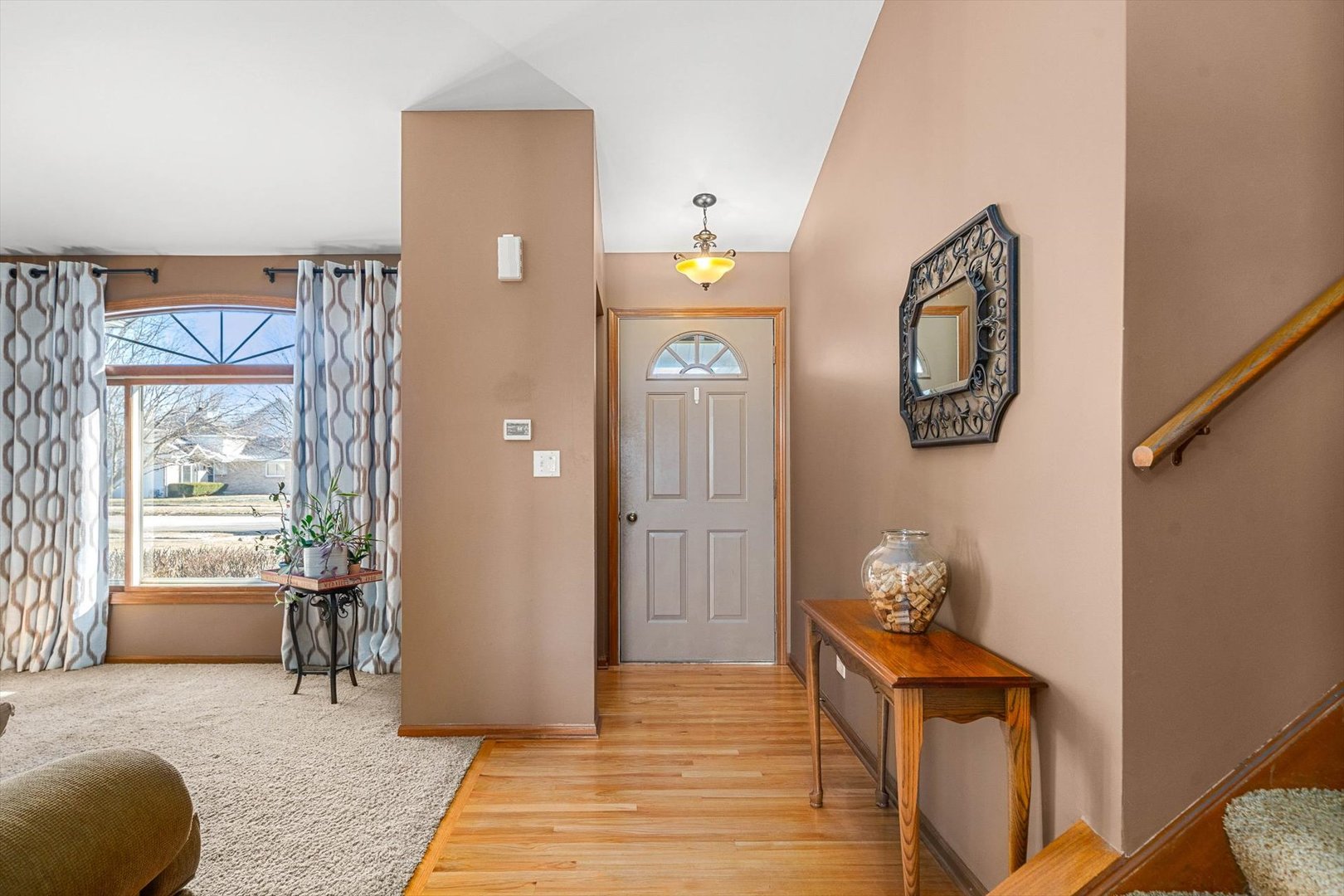 431 Badger Lane Oswego, IL 60543 - Photo 2 of 19 a view of a livingroom with furniture and windows