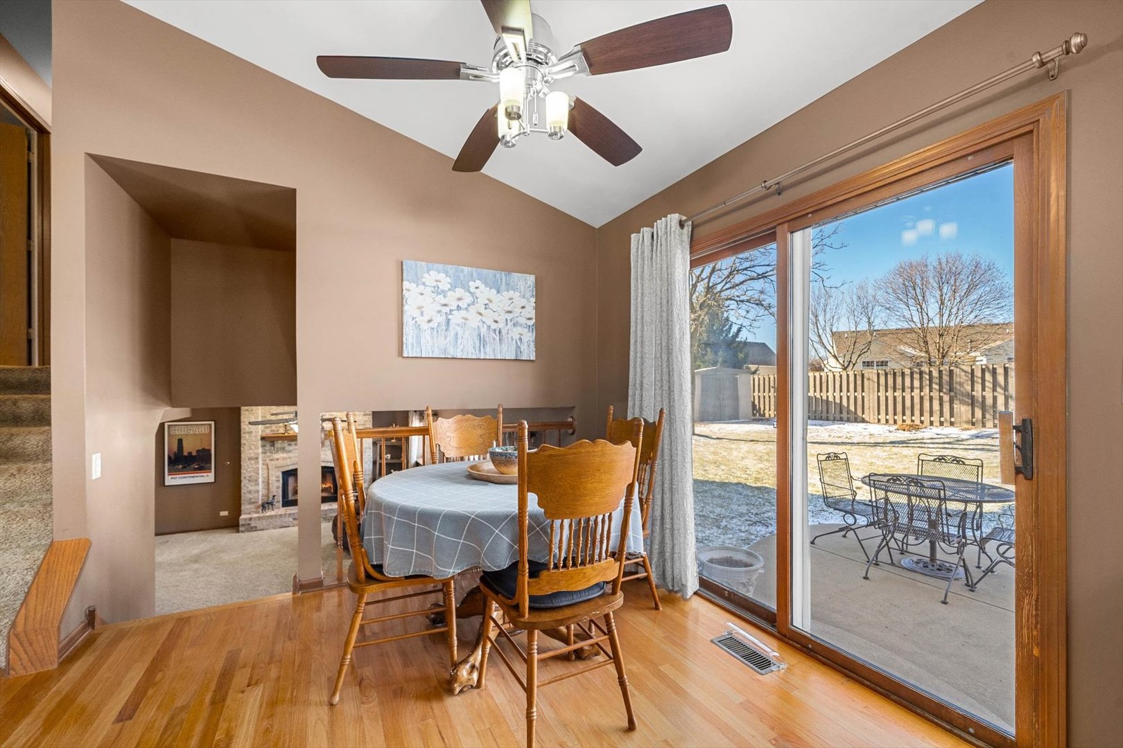 431 Badger Lane Oswego, IL 60543 - Photo 6 of 19 a dining room with furniture and wooden floor