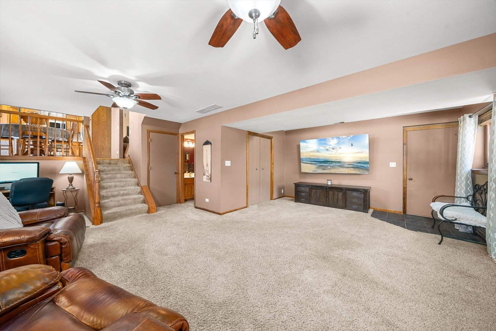 431 Badger Lane Oswego, IL 60543 - Photo 8 of 19 a view of a livingroom with a workspace and a couch