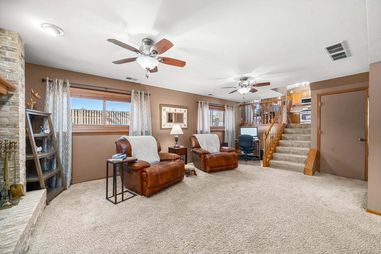 431 Badger Lane Oswego, IL 60543 - Photo 9 of 19 a living room with furniture and a large window