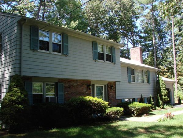 378 Hayward Mill Road Concord, MA 01742 - Photo 1 of 15 a front view of a house with a yard and garage