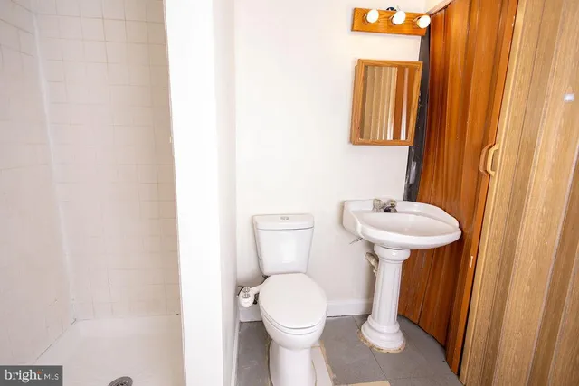 a bathroom with a sink and a toilet
