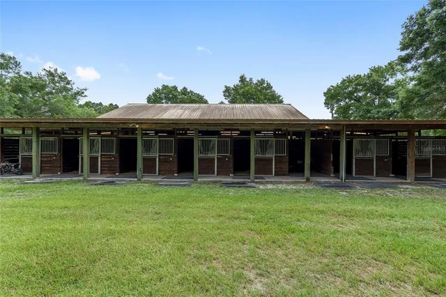 front view of a house with a garden